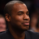 Jason Collins watches an NBA game between the Brooklyn Nets and the Milwaukee Bucks Nov. 19, 2014, at the Barclays Center in New York City.
DON EMMERT/AFP/Getty Images